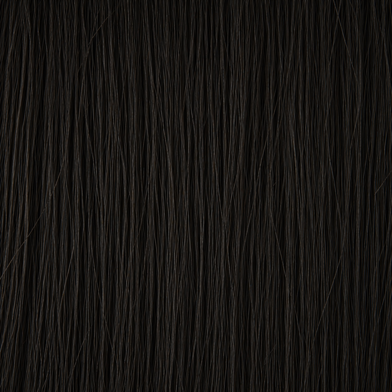 Primo piano della struttura dei capelli Remy nel colore #1A Nero naturale