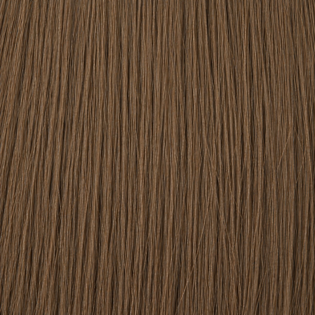 Primo piano della struttura dei capelli Remy nel colore #5 Castano chiaro
